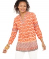 Make a pattern play in Style&co.'s colorful petite tunic. The crinkle-texture fabric adds a unique twist!