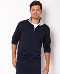 Hit the gym in style with this quarter-zip sweatshirt from Nautica.