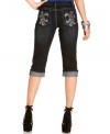 Add these rockstar-inspired jeans to your summer fashion arsenal! Earl Jeans' petite capris make a sleek style statement that's punctuated by rhinestones and embroidered detail at the pockets.