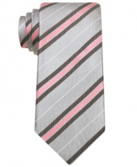 Keep it sleek and slim. Diagonal stripes and a skinny design make this tie from Bar III the perfect pick for the modern man.
