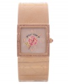 As pretty as your favorite bracelet, this Betsey Johnson bangle watch gleams in rose-gold hues and floral accents.