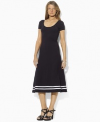A timeless petite dress is rendered in a soft cotton blend and finished with a flared skirt for a modern silhouette, from Lauren by Ralph Lauren.