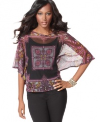 An exotic print on a sheer overlay with batwing sleeves makes for sophisticated, worldly style. Complete with a coordinating cami, it's a gorgeous look you'll want to wear again and again. (Clearance)