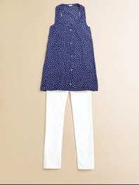 Pretty little polka dots add punch to a charming, cheery style.ScoopneckSleevelessButton frontRayonMachine washImported