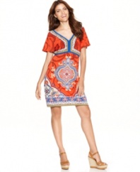 Exotic touches and a chic silhouette make Style&co.'s petite jersey dress a must-have for the season!