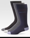 Lightweight and breathable solid dress socks with logo detail and heel and toe contrast, finished in a smooth, stretch cotton blend.Set of 3Mid-calf height75% cotton/23% polyesteramide/2% elastaneMachine washImported