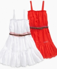 She won't let a single sunny summer afternoon go to waste in this smocked and belted dress from Guess.