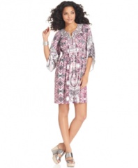 A breezy addition to your summer wardrobe: Style&co.'s petite dress features beautiful asymmetrical sleeves and a flattering smocked silhouette. A bold print is easy to pair with your favorite metallic sandals!