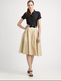 Style is in full swing with this pleated cotton/linen skirt featuring a duo of patch pockets.Belt loopsPleated designPatch pocketsBack zipperAbout 29 long52% cotton/48% linenDry cleanImported