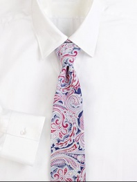 An artful paisley pattern distinguishes this fine Italian silk tie. About 3 wideSilkDry cleanMade in Italy