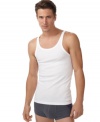 Silence your sweat with a tank top three-pack from Emporio Armani.