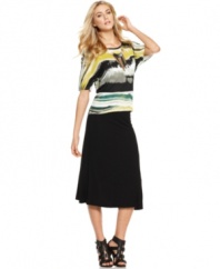 Trend-right, midi length meets fluid, a-line design on a closet-staple-chic skirt from Kensie.