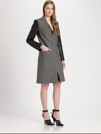 Power dressing in its finest form, this tailored, wool-rich coat has modern seaming, croc-print faux leather sleeves and a back vent for comfort. V-neckCroc-print faux leather sleevesSlash pocketsBack ventAbout 39 from shoulder to hem80% virgin wool/20% polyamideDry cleanImported of Italian fabricModel shown is 5'10 (177cm) wearing US size 2.