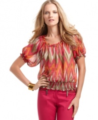 A peasant-style blouse gets a major upgrade from MICHAEL by Michael Kors. A smocked silhouette and tropical hues make this petite printed top a weekend favorite.