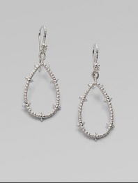 From the Calypso Collection. Spiky open teardrops with white sapphire accents hang from richly ribbed wires in this shining design.White sapphireRhodium platedLength, about 2Ear wireImported