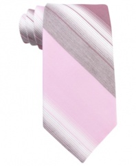 Follow the lines in your wardrobe. With sleek stripes, this Calvin Klein tie always keeps it cool.
