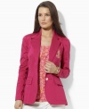 Lauren by Ralph Lauren tailored a chic jacket in sleek stretch cotton sateen with a signature embroidered crest for a preppy look.