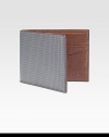 Inspired by the standard geometric graph paper, this leather credit card holder finds the balance between practicality and style.One billfold compartmentSix card slotsLeather4W x 4HImported