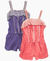 Dainty detailing. She can jump into this embroidered stitching romper from Jessica Simpson to look stylish in the sun.