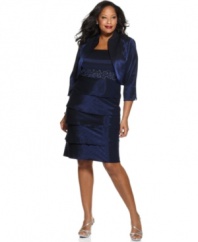 A coordinating cropped jacket puts a sophisticated finish on this shimmering plus size dress by R&M Richards.