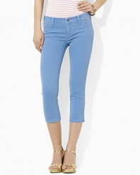 An essential cropped denim jean features a slim, straight leg and a hint of stretch for a versatile, modern look.