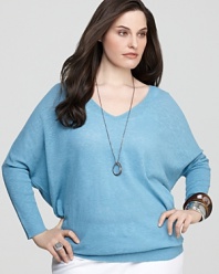 This Eileen Fisher tunic brings casual elegance to everyday styling with flowing dolman sleeves and a gently tapered hem.