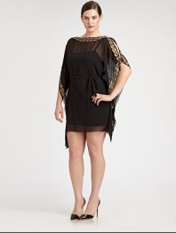 Inspired by the classic caftan, this gorgeous, sheer design features gilded trim and sultry, cold-shoulder sleeves. The self-tie belt will define your waist, creating a phenomenal silhouette. BoatneckCold-shoulder sleevesSelf-tie beltSlip includedGold embroidered trimAbout 36 from natural waistPolyesterSpot cleanImported