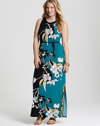 Graphic florals punctuate the floor-sweeping silhouette of this Tahari Woman Plus maxi dress. Slip the style under a leather jacket for a modern take on femininity.