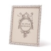 Crystal & Pearl Frames by Olivia Riegel. Delicate frame with faux pearls and Swarovski crystals in a silver-tone metal finish.