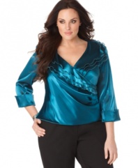 R&M Richards' plus size top makes a shimmering statement with its ruffle-tiered surplice neckline and cuffed sleeves.