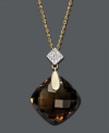 Instant sparkle in warm, chocolate hues. This delicate pendant features a large, faceted smokey topaz (10-1/2 ct. t.w.) and sparkling diamond accents. Crafted in 14k gold. Approximate length: 18 inches. Approximate drop: 1 inch.