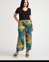 A bold print breathes a fresh, new energy into a classic palazzo silhouette, making these pants a must-own this season. You will find the front pleats beyond flattering. Elasticized waistbandPleats at waistSlash pocketsAllover printInseam, about 27ViscoseDry cleanMade in USA