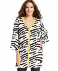 Electrify your leggings with Alfani's three-quarter sleeve plus size top, featuring a striking print!