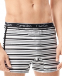 Update your underwear with a touch of style. These knit Calvin Klein boxers in ultra-soft stretch cotton jersey sport a colorful striped design and a slimmer fit.