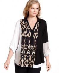 Make an on-trend statement with Calvin Klein's roll-tab sleeve plus size shirt, highlighted by a colorblocked design and safari print.