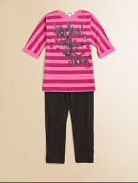Rock out with this adorable two-piece set featuring bold stripes and whimsical printing atop complimentary leggings for a stylish ensemble. Tunic CrewneckCuffed three-quarter sleevesPullover style Leggings Front buttonZip flyTunic: 60% cotton/40% rayonLeggings: 95% cotton/5% spandexMachine washImported Please note: Number of buttons may vary depending on size ordered. 