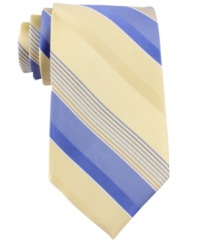 Go bold. This silk striped tie from Michael Kors makes an instant style statement in your wardrobe.