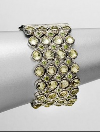EXCLUSIVELY AT SAKS. From the Irma Collection. Faceted lemon citrine set in a sterling silver multi-row design, accented in complimentary peridot stones. Lemon citrine and peridotSterling silverLength, about 7Push lock closureImported