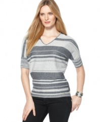 Add a sleek stripe (and a little sparkle!) into your ensemble with this petite sweater by Calvin Klein.