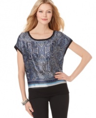 AGB's petite top features an exotic print and a contemporary silhouette that looks spectacular with slim-fitting pants and high-heeled boots! (Clearance)