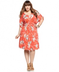 Look beautiful in blossoms with American Rag's short sleeve plus size dress, cinched by a ruched waist.