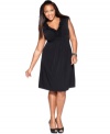 A ruffled neckline lends feminine elegance to Charter Club's sleeveless plus size dress, defined by a flattering A-line shape-- look dazzling from desk to dinner!
