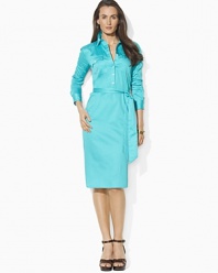A classic shirtdress is rendered in bold cotton sateen with a self-belt waist for a figure-flattering fit.