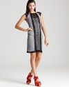 A cool mix of fabrication and pattern brings striking textural interest to this Nanette Lepore dress.
