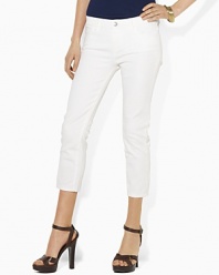 An essential cropped denim jean features a slim, straight leg and a hint of stretch for a versatile, modern look.