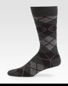 A complementary addition to your wardrobe essentials, in a modernized argyle pattern knitted in a lightweight cotton blend.Mid-calf height66% cotton/20% modal/12% polyamide/2% elastaneMachine washMade in Italy