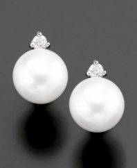 Capture the beauty of the ocean with Belle de Mer's gorgeous cultured freshwater pearl stud earrings (6-1/2-7 mm) complete with diamond accents set in 14k gold.