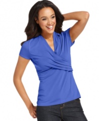 A sleek crossover design lends feminine touch to Charter Club's easy petite top. Pair it with dark jeans for a fresh take on casual style!