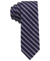 Enter the stripe zone with sleek style. This skinny tie from Calvin Klein lets you power up with a pattern play.
