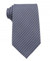 Check yourself in sleek style. This tie from Calvin Klein lets you power up with a pattern play.
